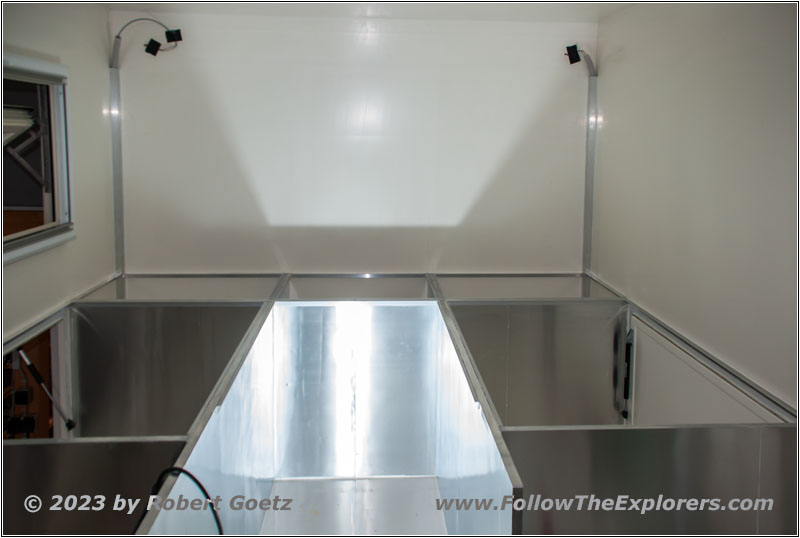 Shelter rear storage and bed area Shelter rear storage and bed area