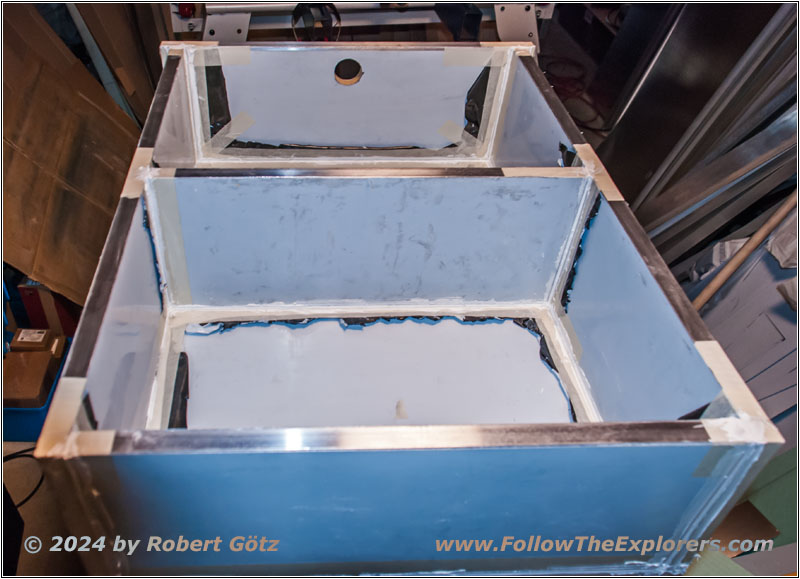 Shelter drawer above water tank Shelter drawer above water tank