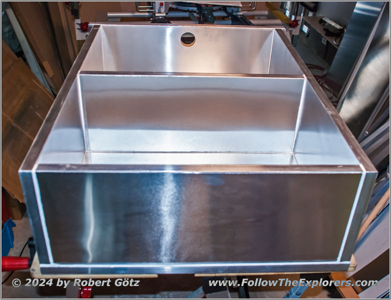 Shelter drawer above water tank Shelter drawer above water tank
