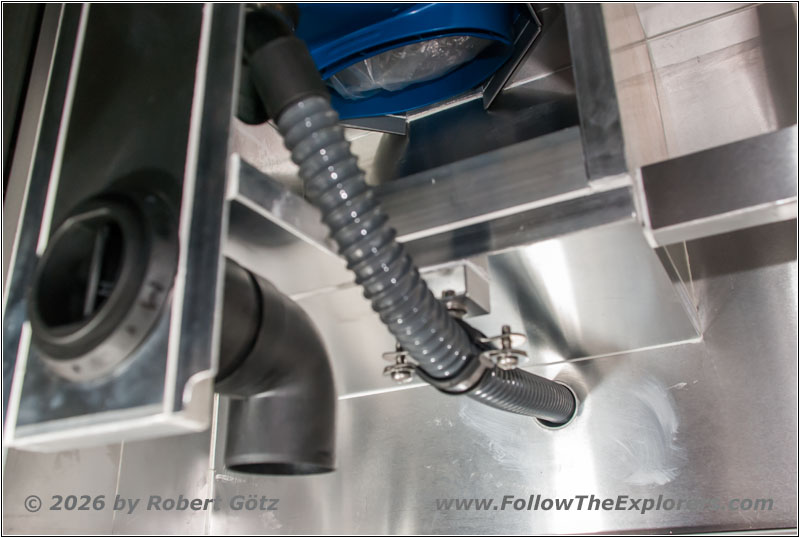 Shelter restroom urine hose mount and duct Shelter restroom urine hose mount and duct