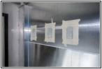 Shelter restroom coat hook support