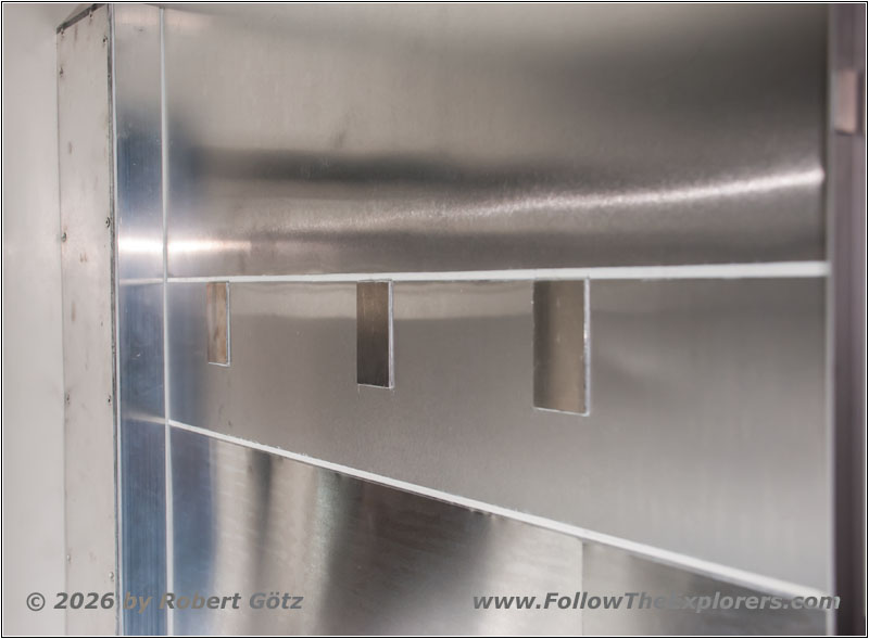 Shelter restroom coat hook support Shelter restroom coat hook support