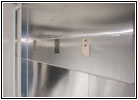 Shelter restroom coat hook mount