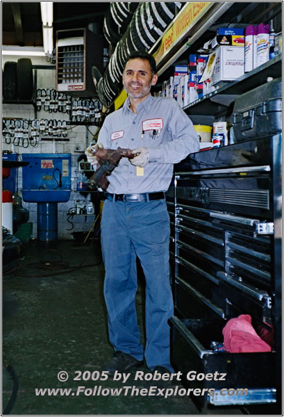 Adnan with broken water pump Adnan with broken water pump